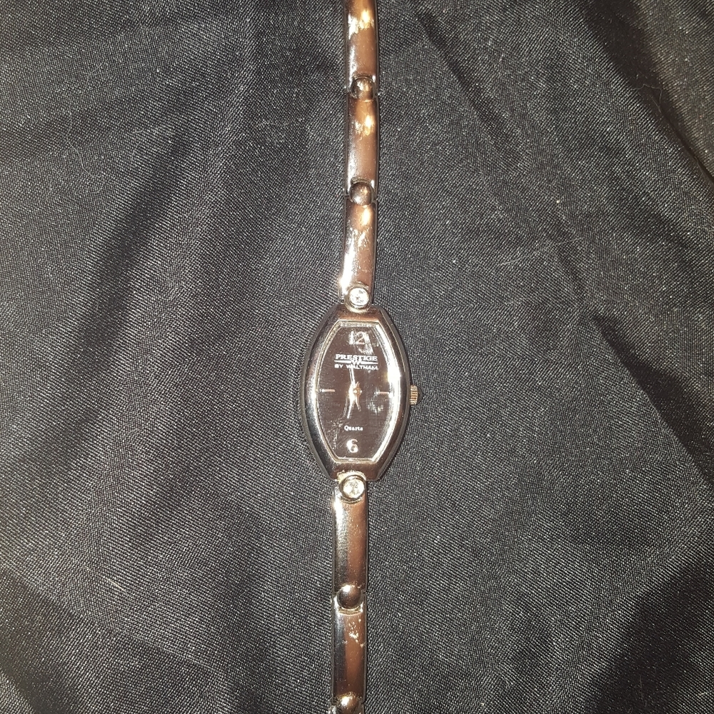 Prestige by Waltham silver link black face watch